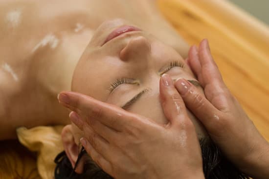 young woman on the ayurvedic aromatherapy oil massage procedure